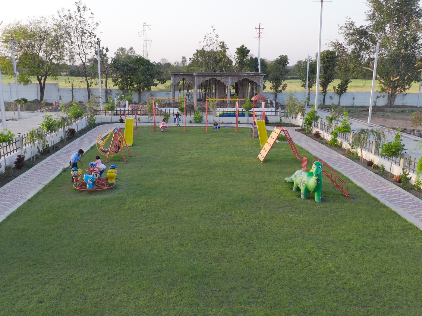 Image of children playing in the vibrant play area at Aaradhya Kunj Colony